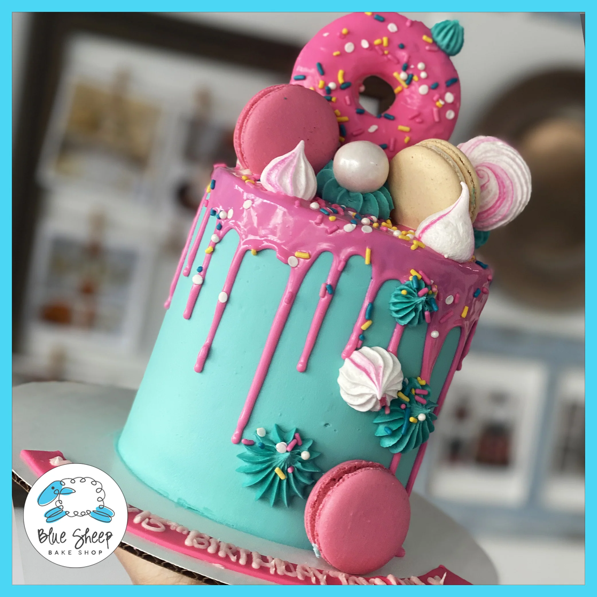 Pink and Teal Donut Bakery Birthday Cake